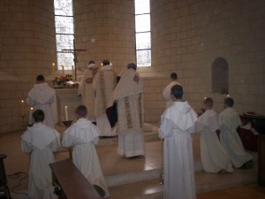 The boys of the school serve a solemn Mass