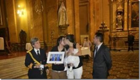 The grotesque spectacle of a lesbian duo desecrating the cathedral of Córdoba, with the portrait of the godmother of "their" child, the Argentine president, Cristina Fernández de Kirchner, represented by a uniformed aide; the farce was performed with the consent of the local bishop, Mgr. Carlos Ñáñez.